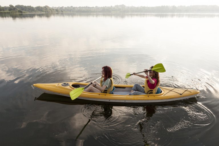 friends rowing kayak